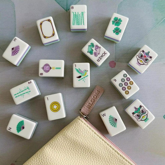 Bloom Garden American mahjong tiles including Wind, Dots, Bams and joker tiles