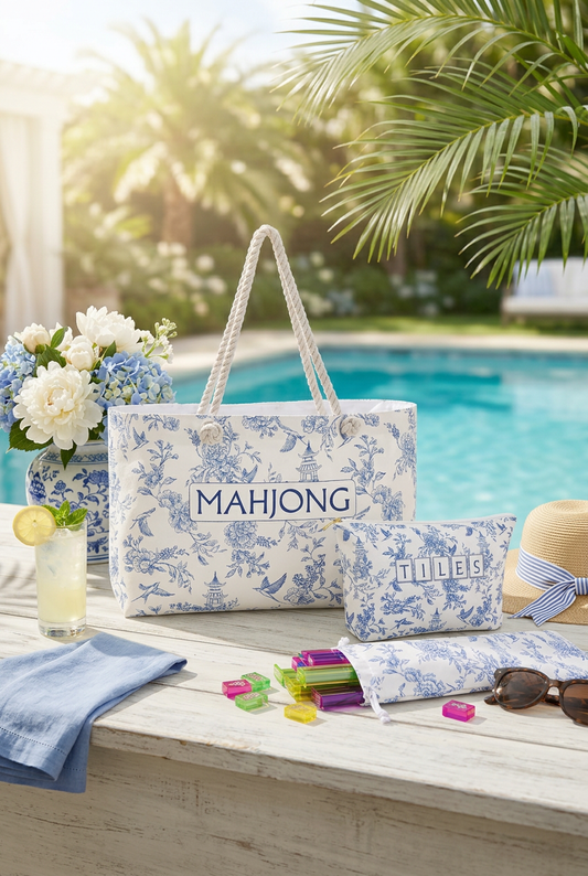 Luxury American Mahjong set with branded Mahjong Loft tote, tiles, and accessories styled poolside