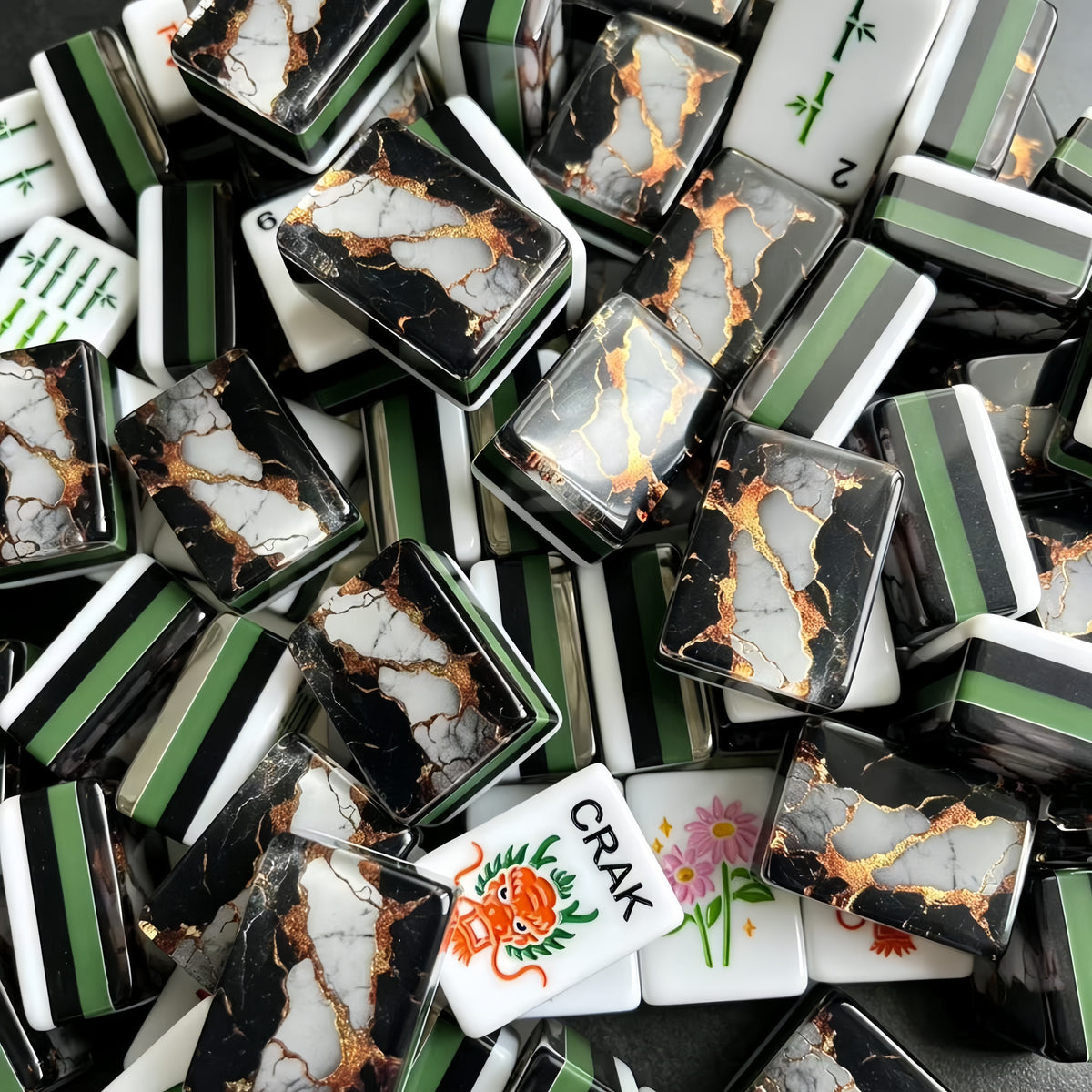 Gilded Obsidian acrylic American mahjong lifestyle pile of faces and marble backs — dragon CRAK flowers and gold veins, Mahjong Loft