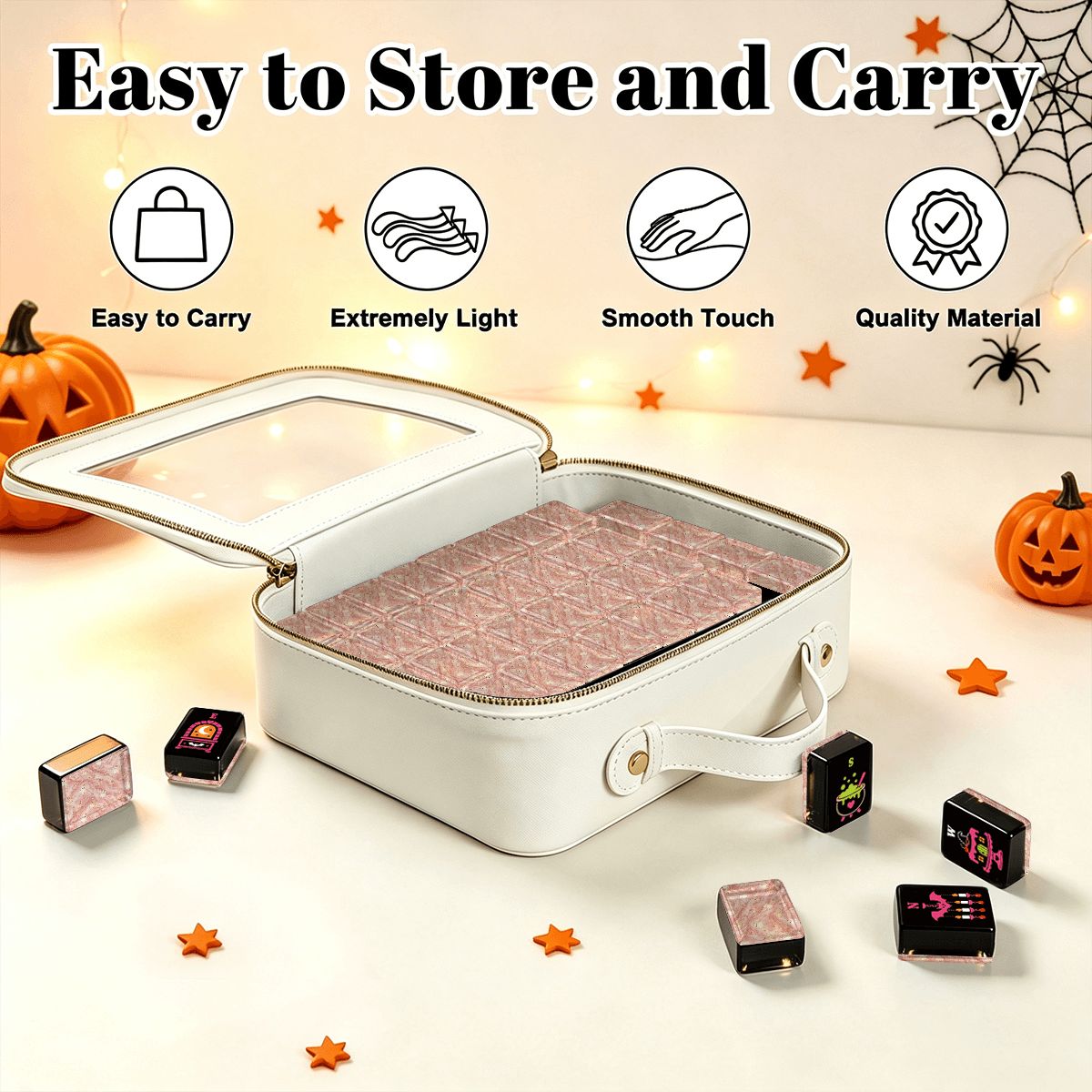 Gothic Dessert Halloween mahjong set shown open in a white carrying case with clear lid and pink patterned tile inserts, styled with jack-o'-lanterns and star confetti