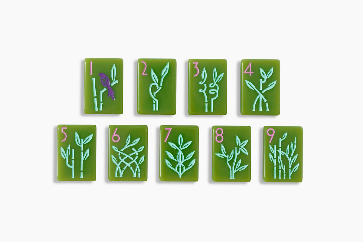 Avocado Botanical avocado green botanical acrylic American mahjong tile set tiles arranged on a clear pusher