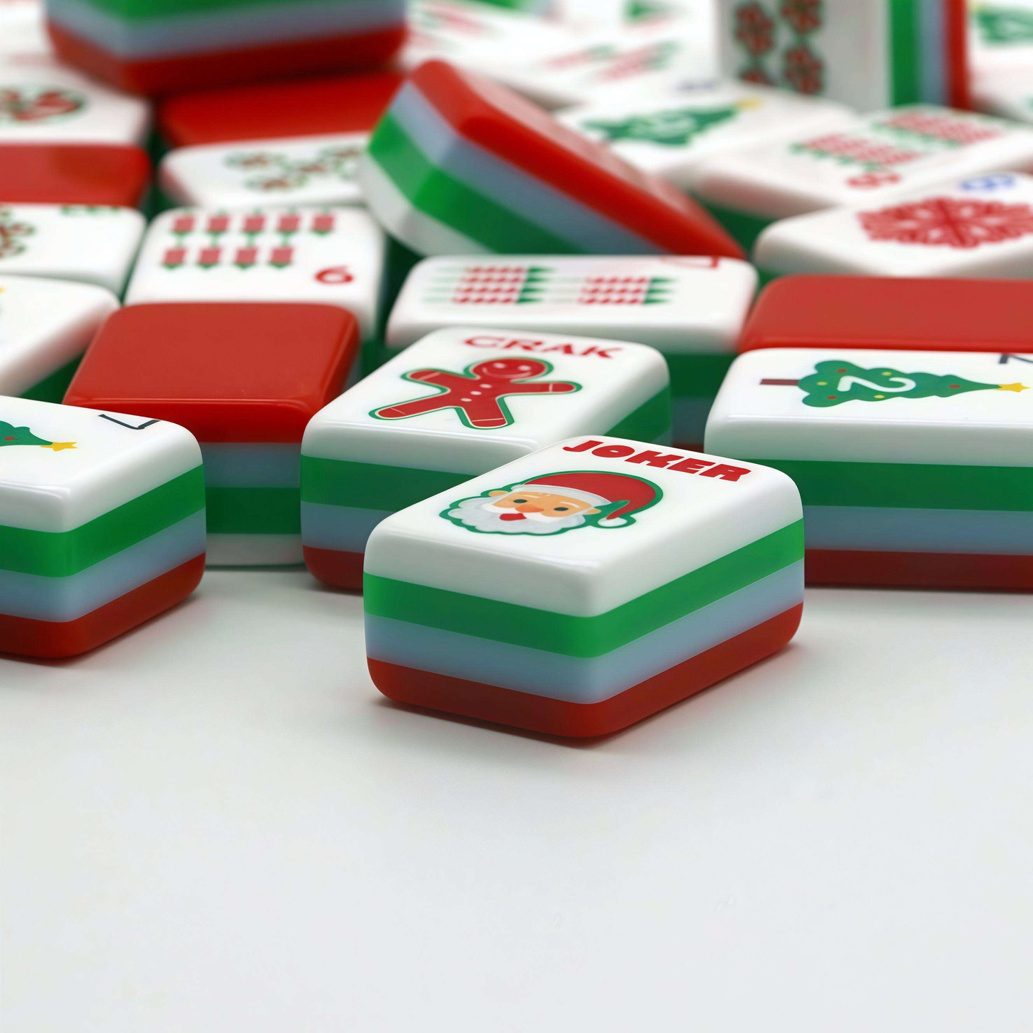 Christmas Cheer Christmas red and green acrylic American mahjong tile set tiles arranged on a clear pusher