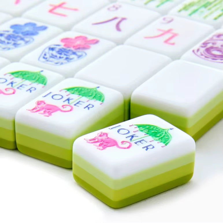 Citrus Garden apple green acrylic American mahjong tile set tiles arranged on a clear pusher