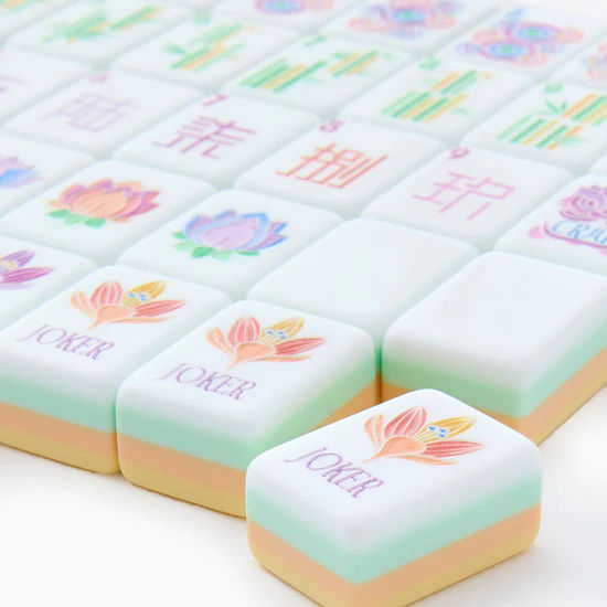 Golden Lotus sunny yellow acrylic American mahjong tile set tiles arranged on a clear pusher