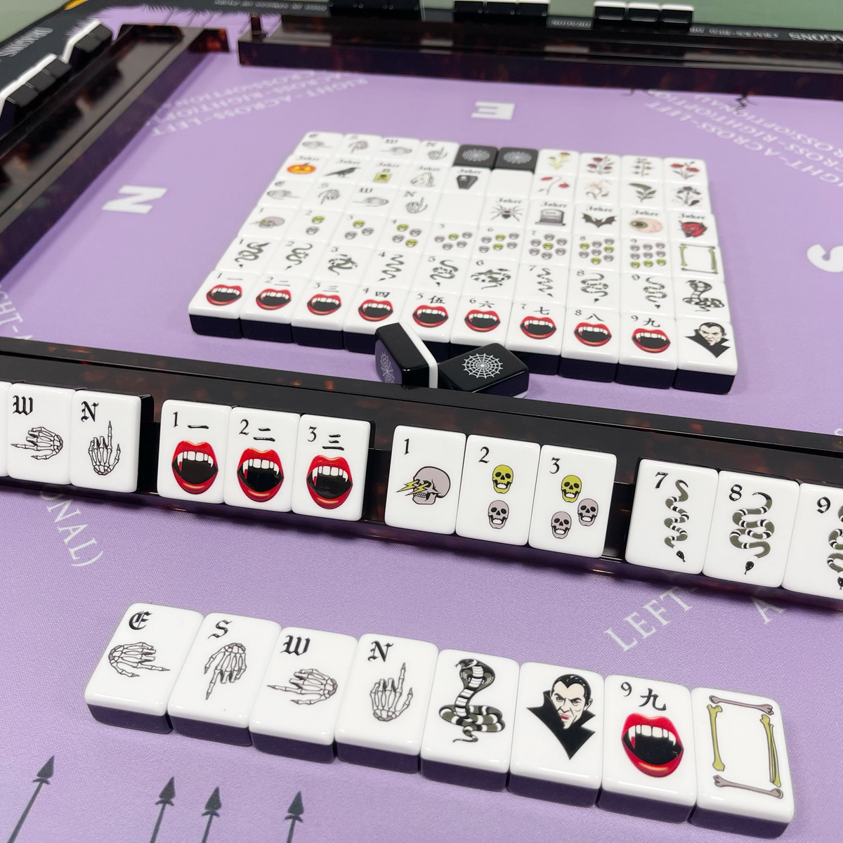 Midnight Fang Halloween acrylic American mahjong tiles on purple mat with racks — gothic lifestyle game layout, Mahjong Loft