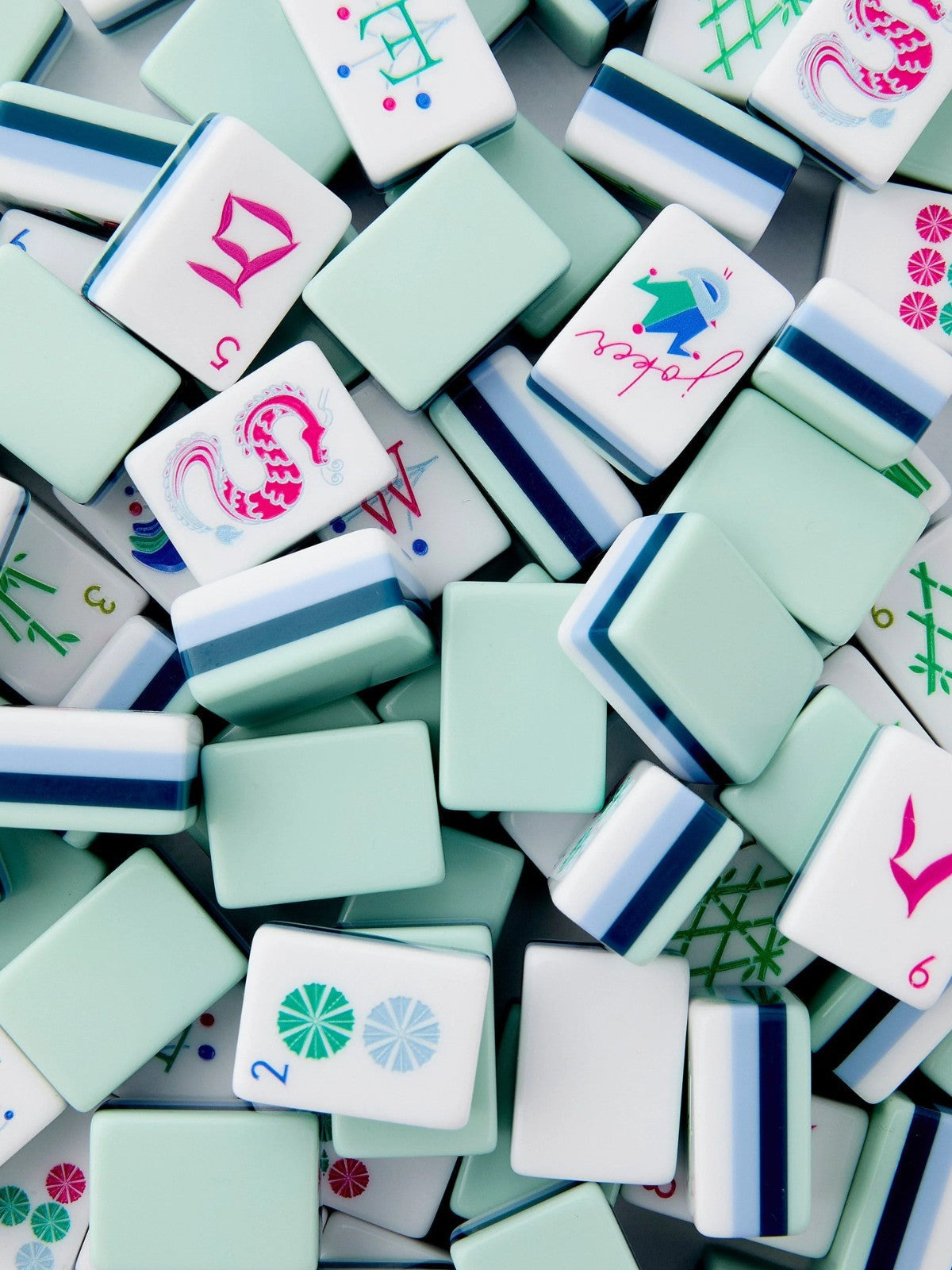 Mint Blossom light green acrylic American mahjong tile set tiles arranged on a clear pusher
