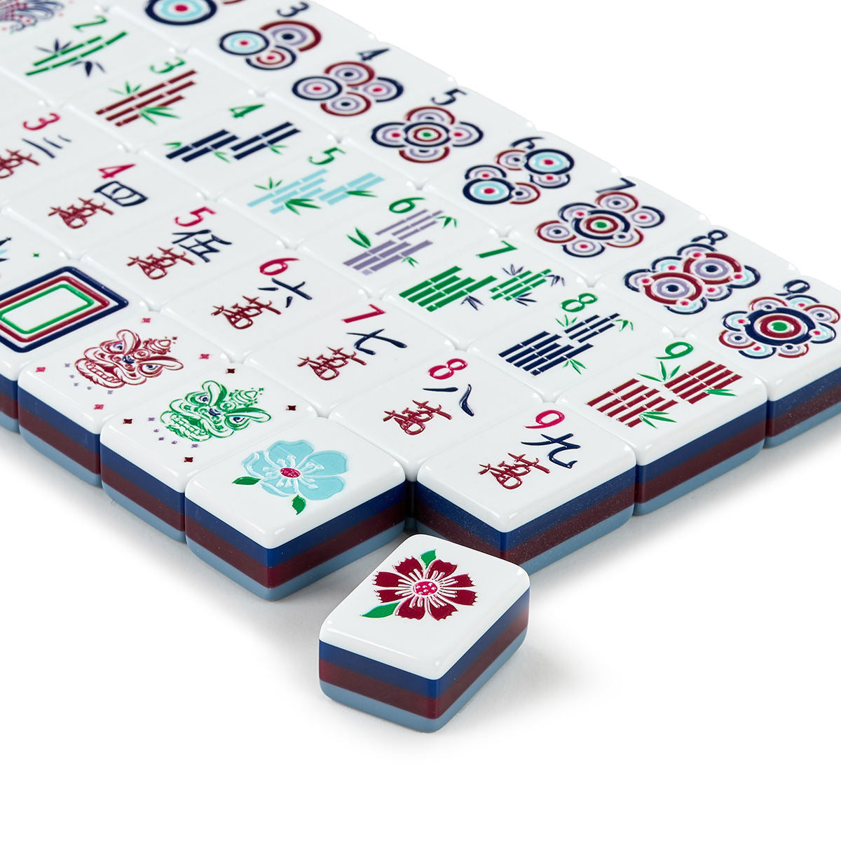 Slate Garden blue-gray acrylic American mahjong tile set tiles arranged on a clear pusher
