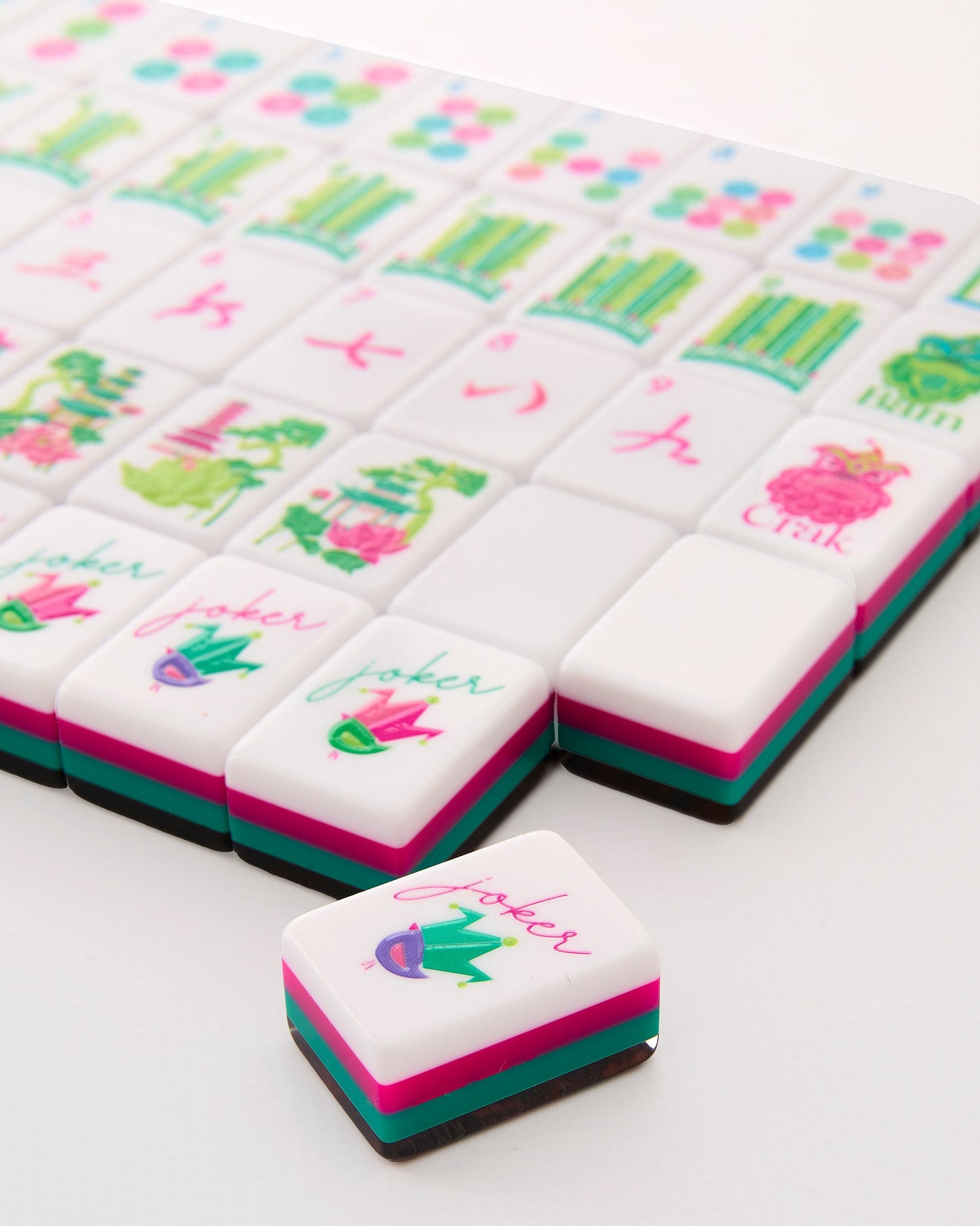 Wild Garden leopard print and fuchsia acrylic American mahjong tile set close-up tile artwork and layered acrylic backs